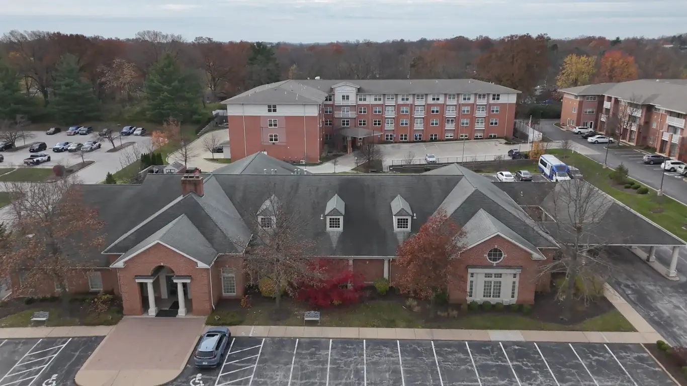 House roof before replacement — worn shingles