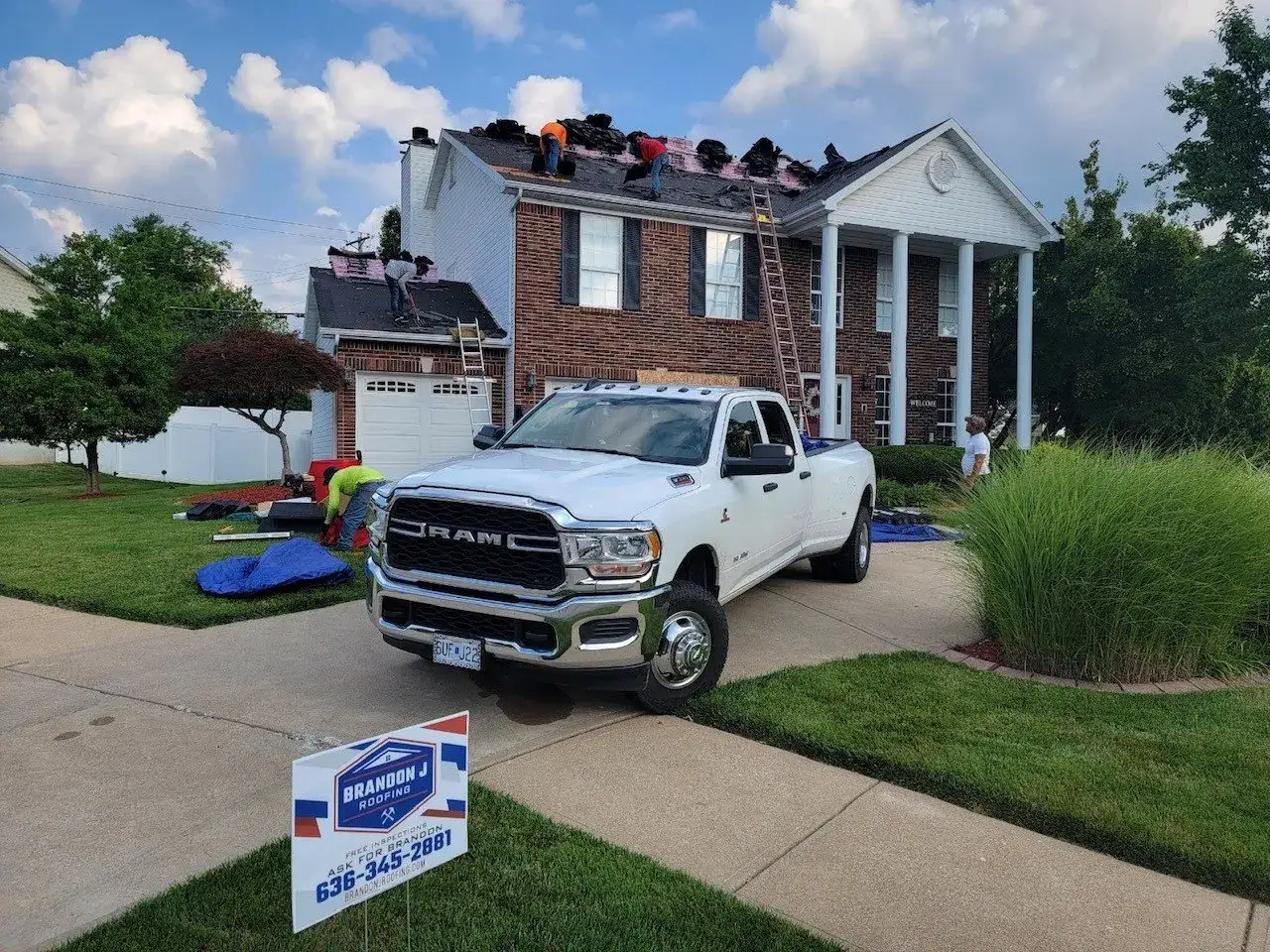 Brandon J Roofing team at work on roof repair